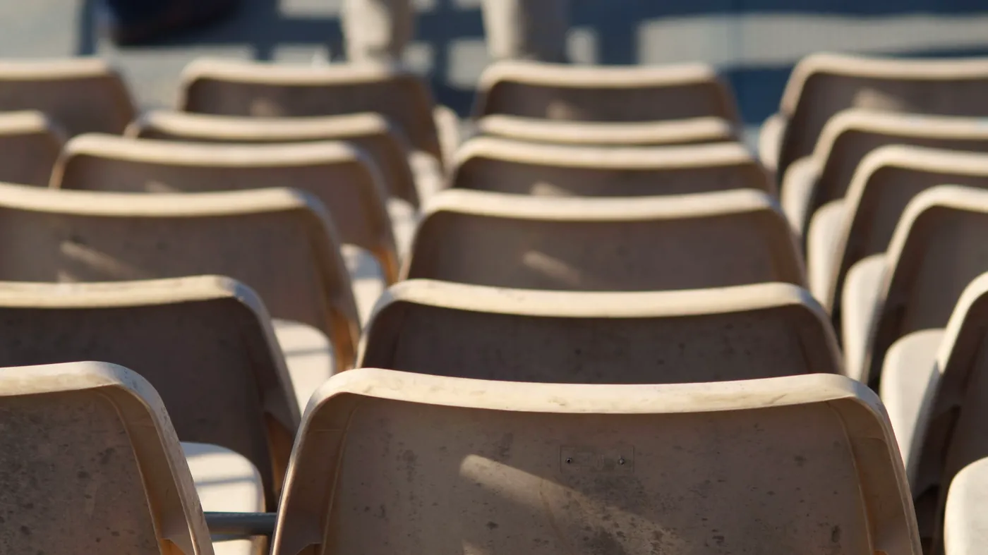 Rows of empty spectator chairs
